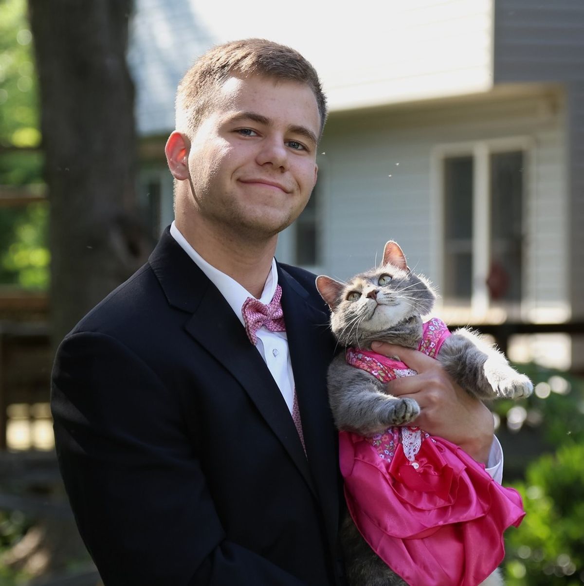 This Guy Couldn't Find a Date to School Prom, So He Took His Cat