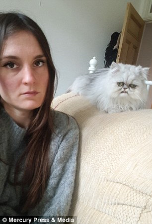 Jenna Millward with her Chinchilla Persian cat named Wilfred