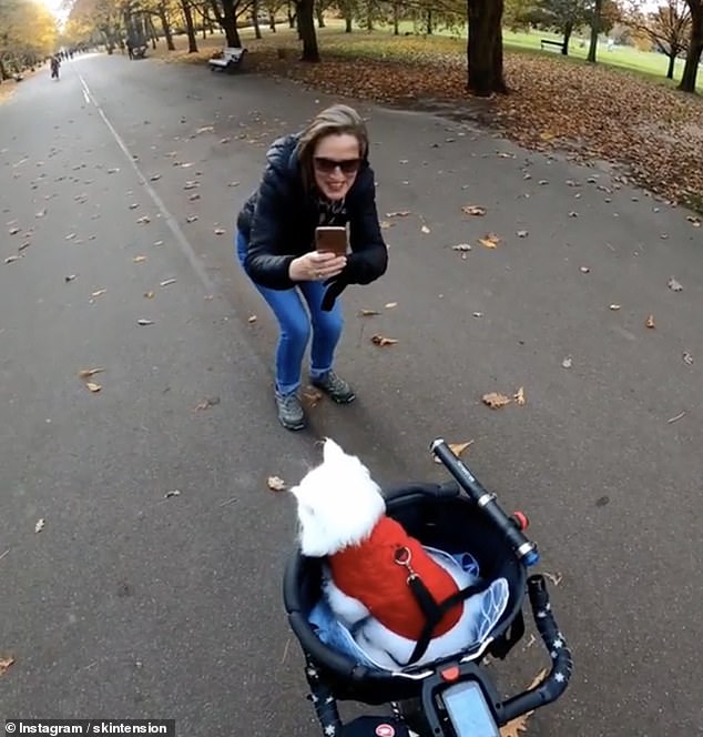 Sigrid getting her picture taken by a passer-by at The Broad Walk in Regent's Park