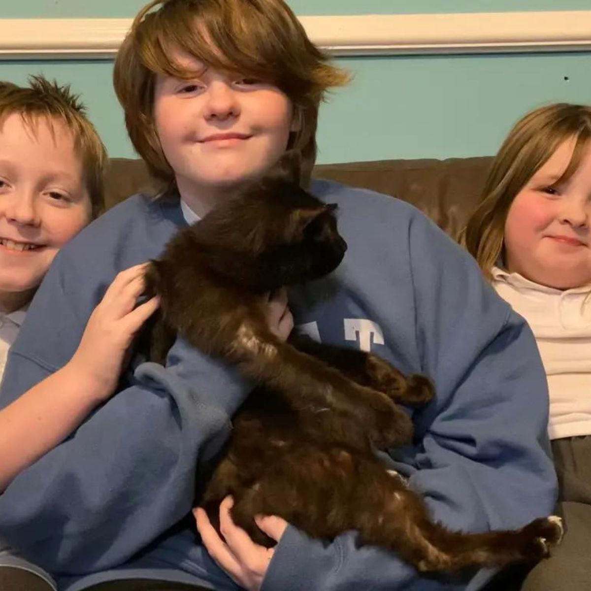 three kids and cat