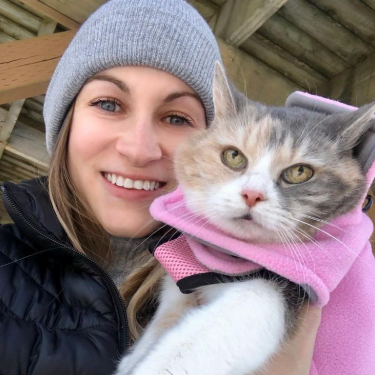 woman and cat outdoors