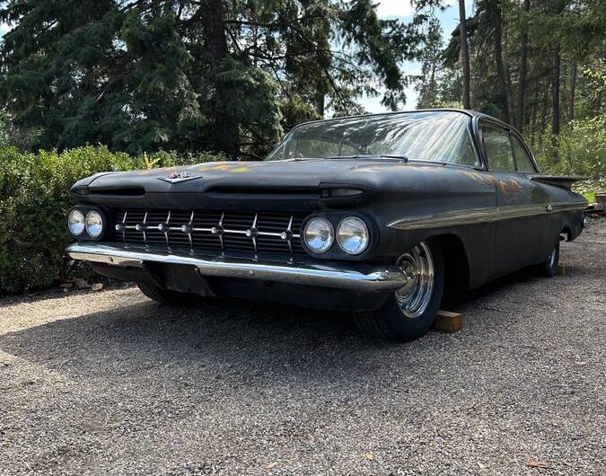 Exploring the Classic 1959 Chevrolet Impala: Unveiling a Thrilling Surprise Under the Hood!