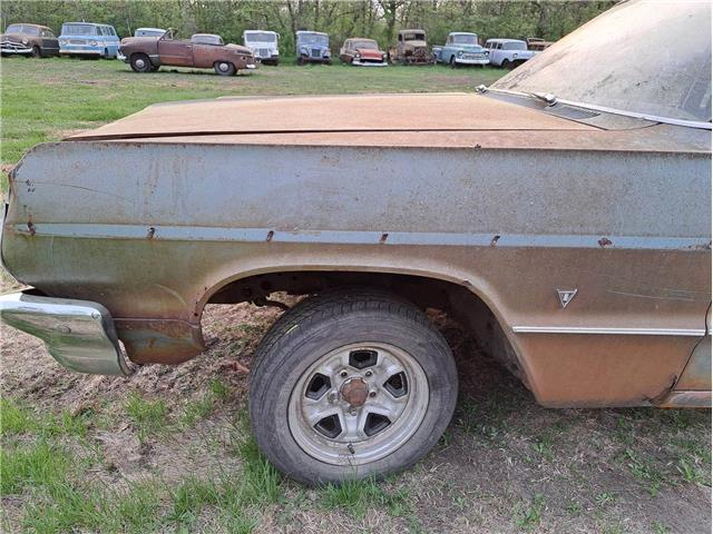 1964 Chevy Impala Forgets the Taste of Pavement, Keeps Hood Secrets Well-Guarded