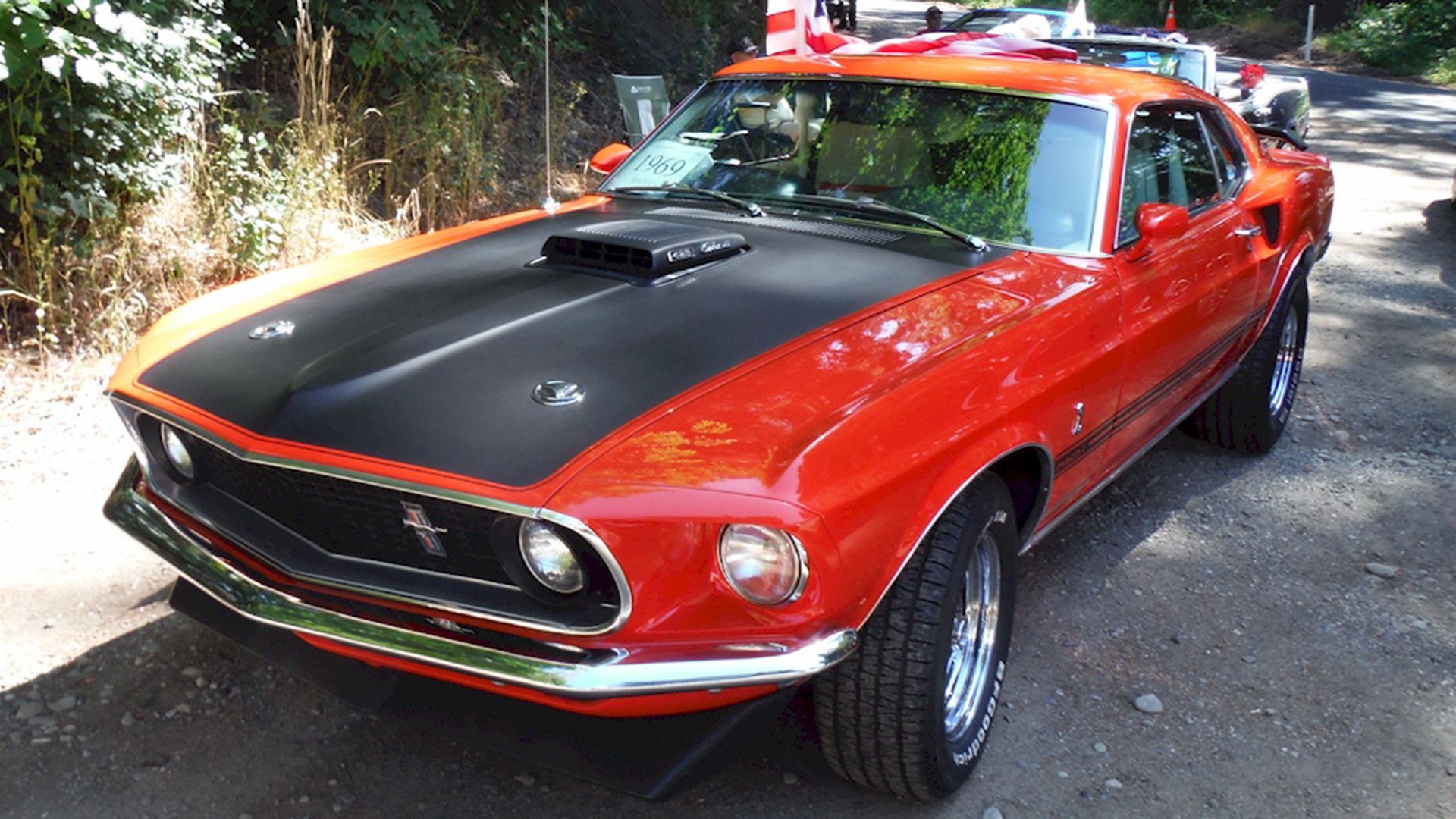 1969 Ford Mustang Mach 1 Calypso Coral finish quarter front 