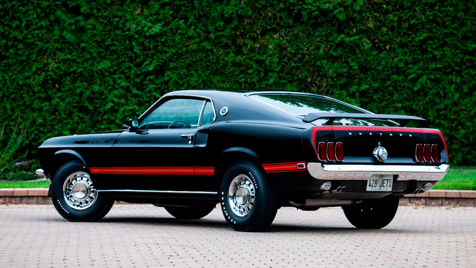 A parked 1969 Ford Mustang Mach I Cobra Jet