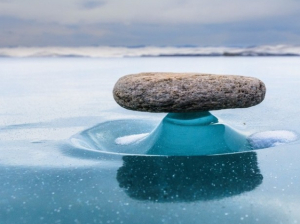 Balancıng rocks on an ıce platform – natural phenomenon occurrıng on Lake Baıkal ın Sıberıa.