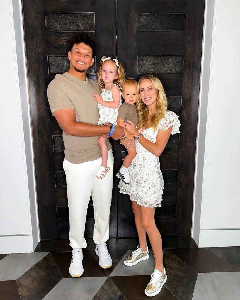 patrick and brittany mahomes holding their kids