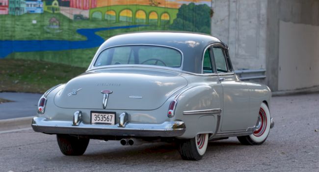 The 1949 Oldsmobile 88 Futuramic Club Coupe: Embracing Futuristic Design and Automotive Elegance