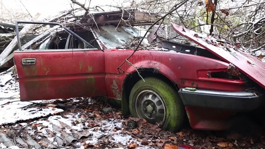 Classic cars abandoned in the woods