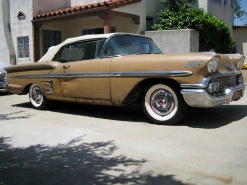 Enigmatic 1958 Chevrolet Impala Convertible Appears as Barn Find Ready for Restoration