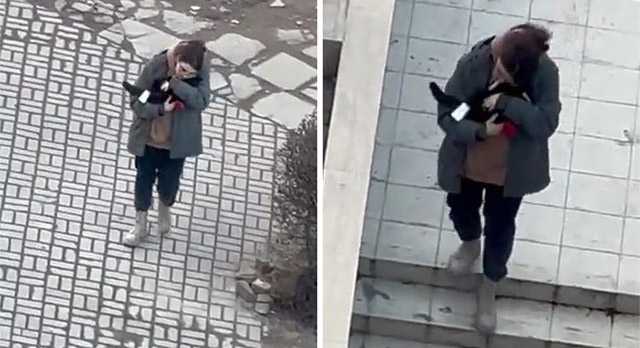 Wοman Carries Аnԁ Comforts Cat Аmiԁ Аir Raiԁ Sirens Sounding In Kyiv, Ukraine