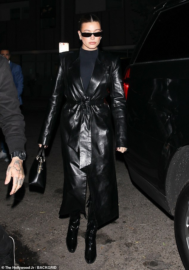 Hailey wore patent leather boots for her evening out